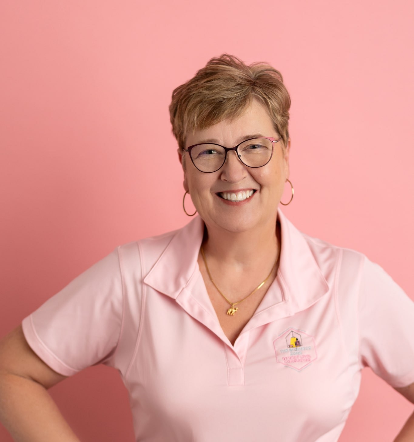 Headshot of Judy Tebow, the owner of The Business Zone.